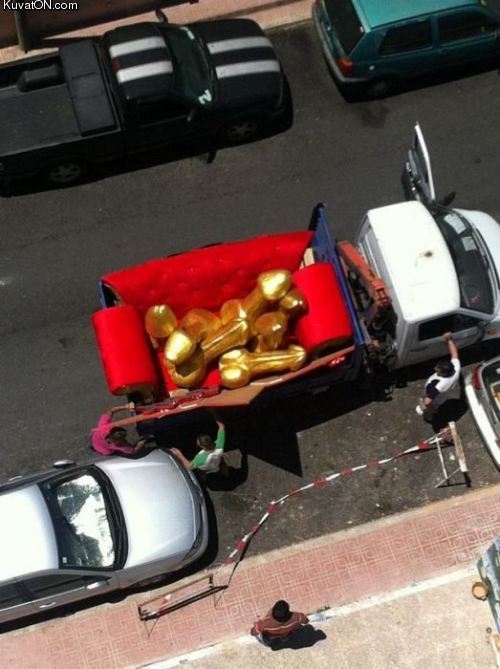 a_truckload_of_huge_gold_penises.jpg