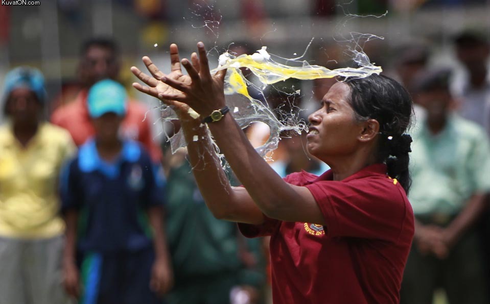an_egg_cracked_over_a_sri_lankan_army_officer_during_a_game_at_an_event_to_celebrate_the_sinhalese_and_tamil_new_year_in_colombo.jpg