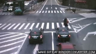 chinese_motorcyclist_narrow_escape.gif