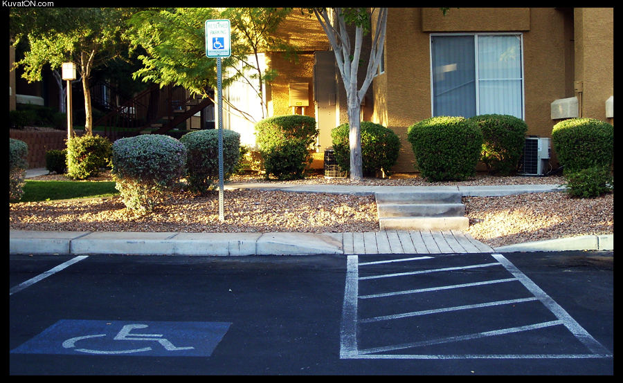 handicapped_parking_with_stairs.jpg
