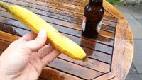 how_to_open_a_beer_with_a_banana.gif