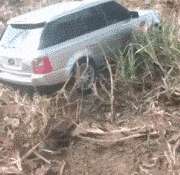 rescuing_a_car_stuck_in_the_mud.gif
