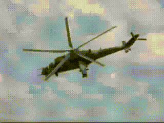 what_happens_when_a_cameras_shutter_speed_is_synchronized_with_a_helicopters_blade_frequency.gif