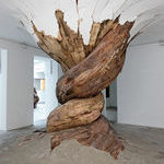 brazilian_artist_henrique_oliviera_creates_sculptures_of_tree_trunks_making_them_look_like_they_burst_through_the_walls_of_the_galleries.jpg