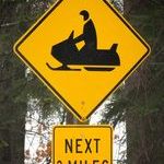 caution_pac_man_driving_snowmobile_next_3_miles.jpg