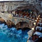 oceanside_restaurant_built_into_a_grotto_in_italy.jpg