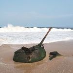 tank_buried_in_sand_remnants_of_the_angolan_civil_war_soyo_zaire_province_angola.jpg