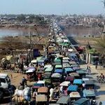 traffic_jam_on_a_bridge_entering_lahore_pakistan.jpg